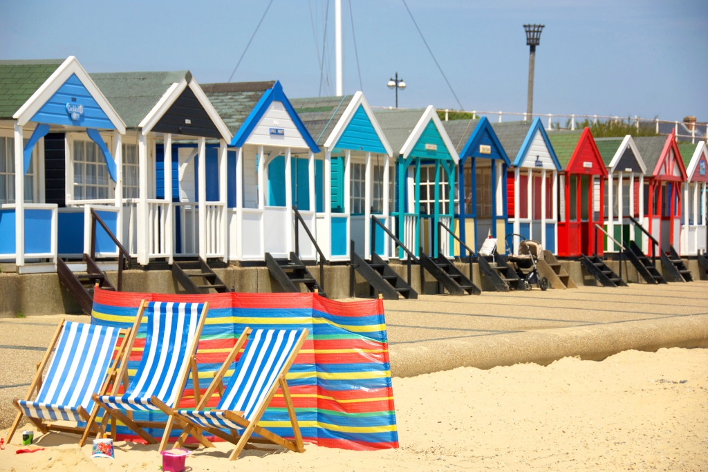Southwold-beach-huts-and-windbreaker.1024x683.jpg